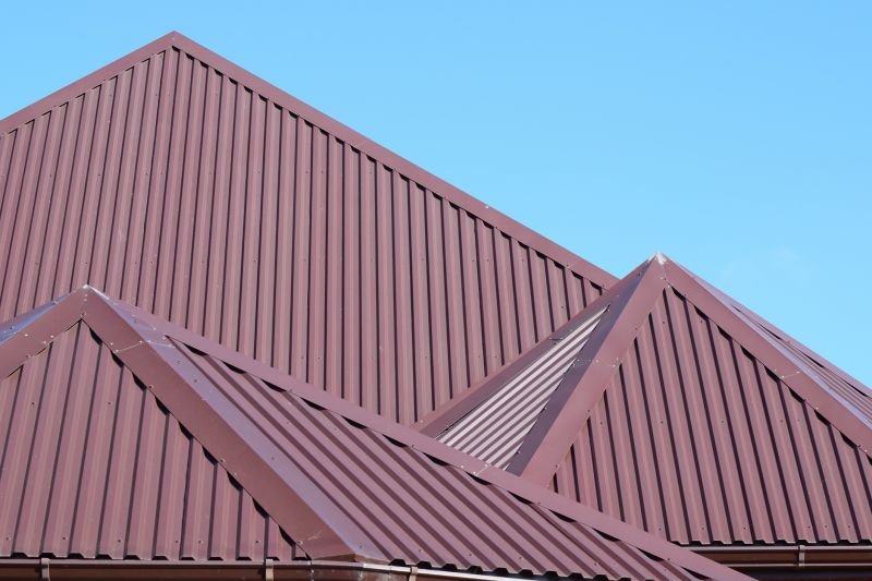 Metal Roof Installation Vs. Asphalt Roofing: Key Differences Explained